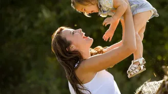 Mother and Daughter Playing 
