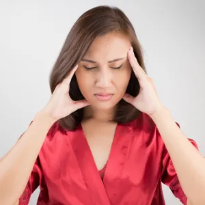 Person experiencing a dizzy vertigo feeling