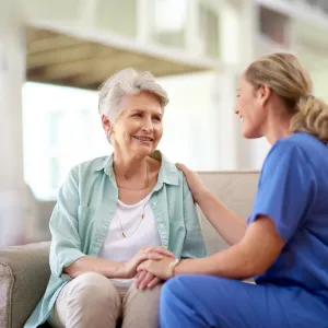 Older woman with a nurse.