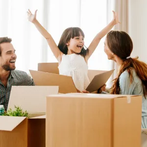 Family unpacking boxes