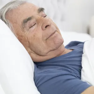 A man sleeps soundly.