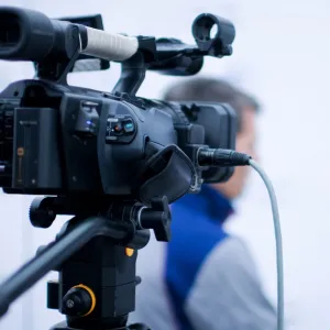 Behind-the-scenes on an interview shoot with reporter