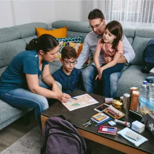 Family preparing wild fire evacuation plan.