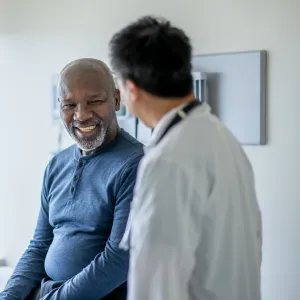 Man Talking to Doctor