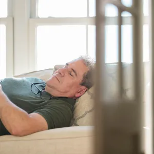 Grandpa is taking a nap.