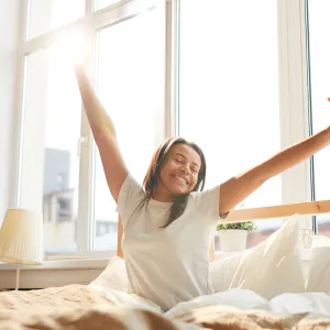 woman wakes up from the most restful sleep of her life.