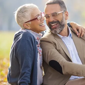 Happy, healthy couple in the park.