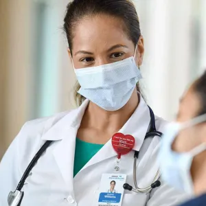 female doctor speaking with patient