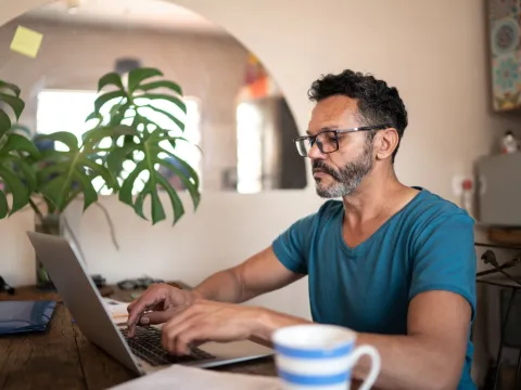 A mature gentleman on his laptop
