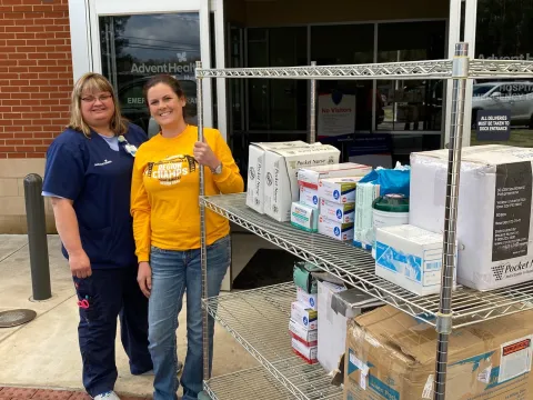 Two women with donations.