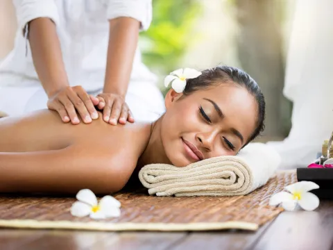 A woman receives a relaxing massage.