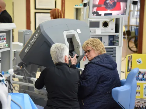 Two nurses from AdventHealth Gordon Robotic Surgery talking.