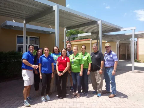 Volunteers helping to provide free sports physicals