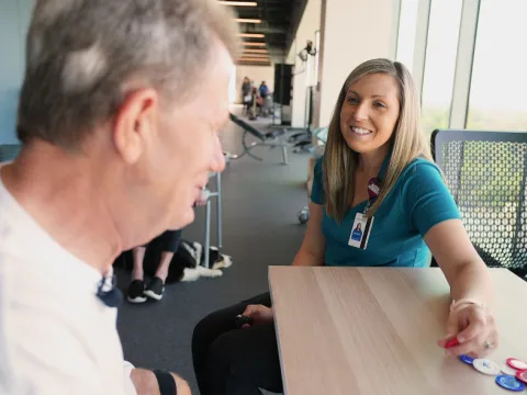 AdventHealth neuro-occupational therapist working with a Vivistim patient.