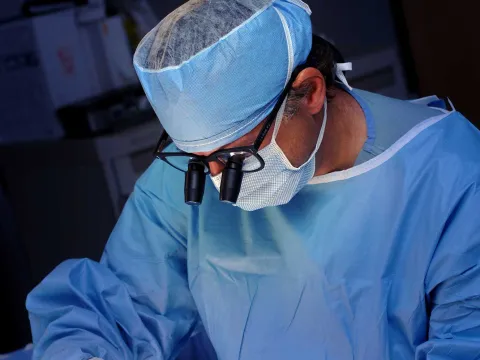 Doctor Lupes conducting a surgery