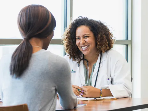 Physician with Patient