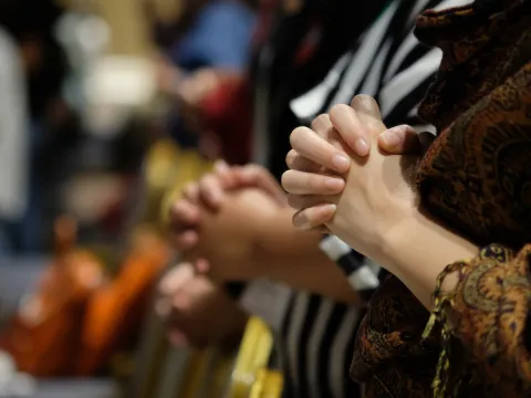join hands and pray