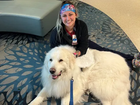 Duke McDreamy comforts an AdventHealth team member.