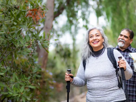 Active people walking in the woods