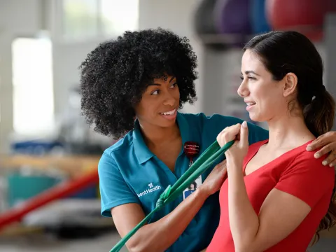 A Therapist Helps a Patient Through a Orthopedic Physical Therapy Session.