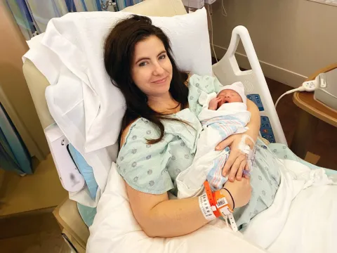 Brandy holding her newborn baby
