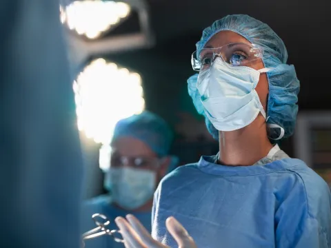A woman surgeon in the operating room.