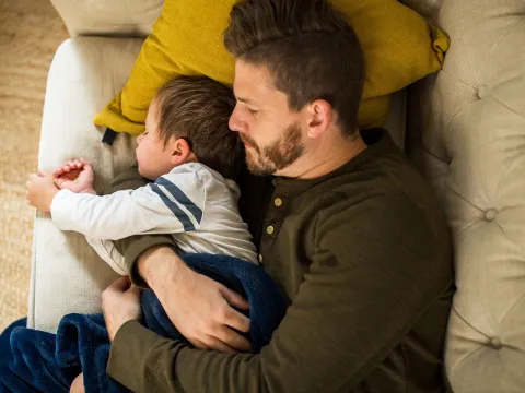 Man and son sleeping