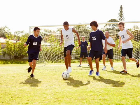 Kids playing soccer