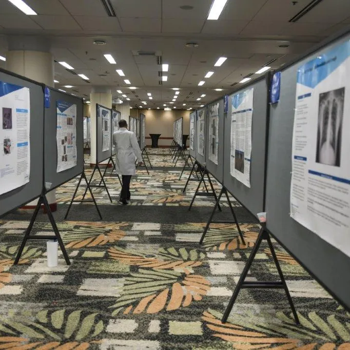 An aisle of research presentations