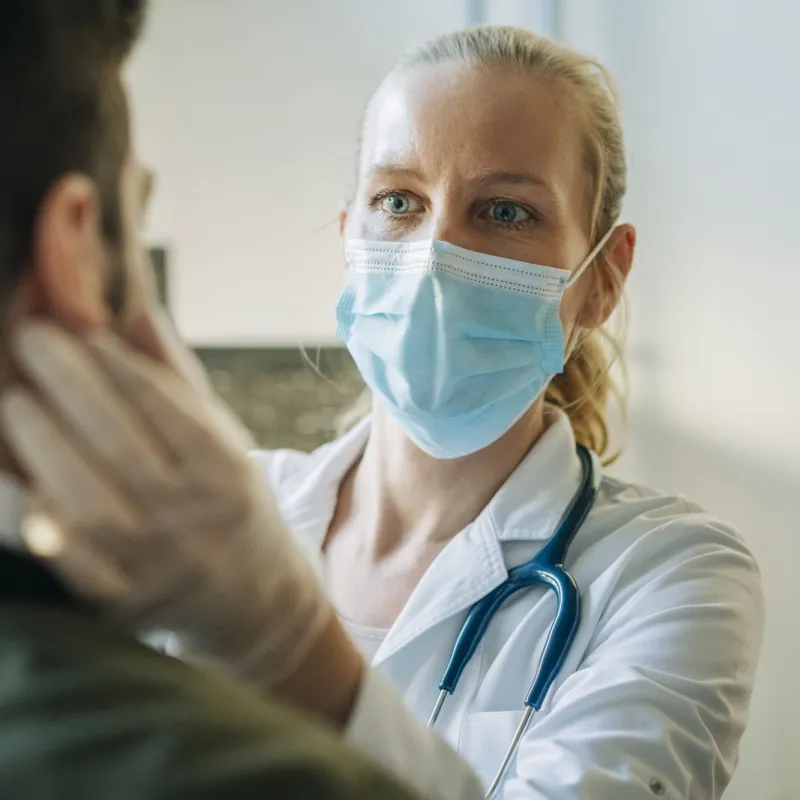 Female physician with patient