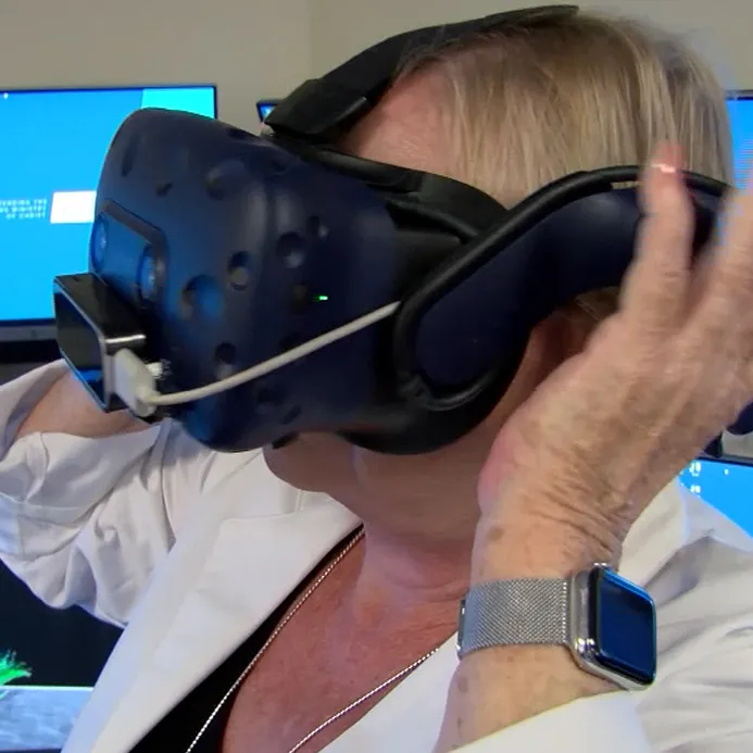 Dr. Rodgers testing the VR goggles during a demonstration