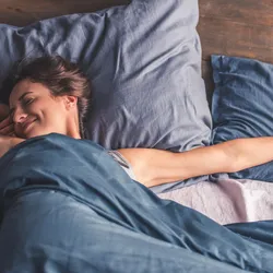 Woman sleeping in bed