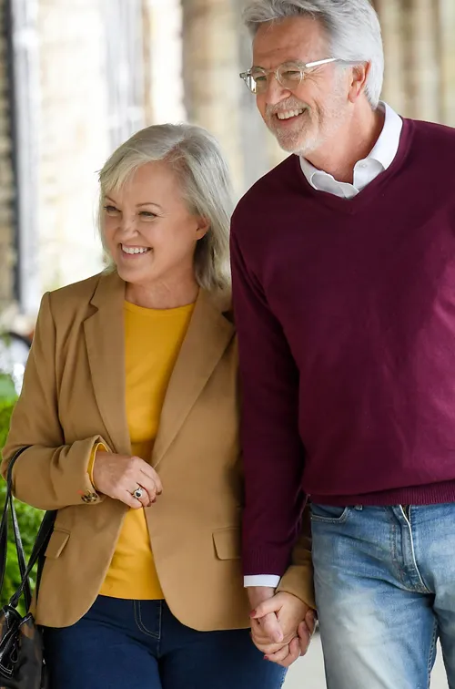 Elderly couple on a shopping trip.