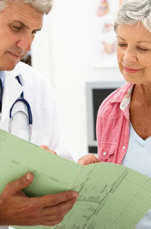 Woman reviewing her imaging test with her doctor
